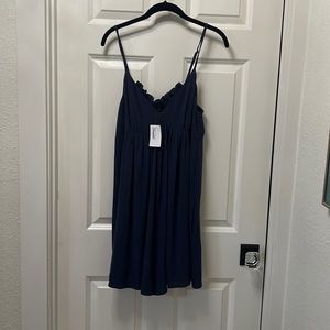 Romper with pockets new with tags, medium